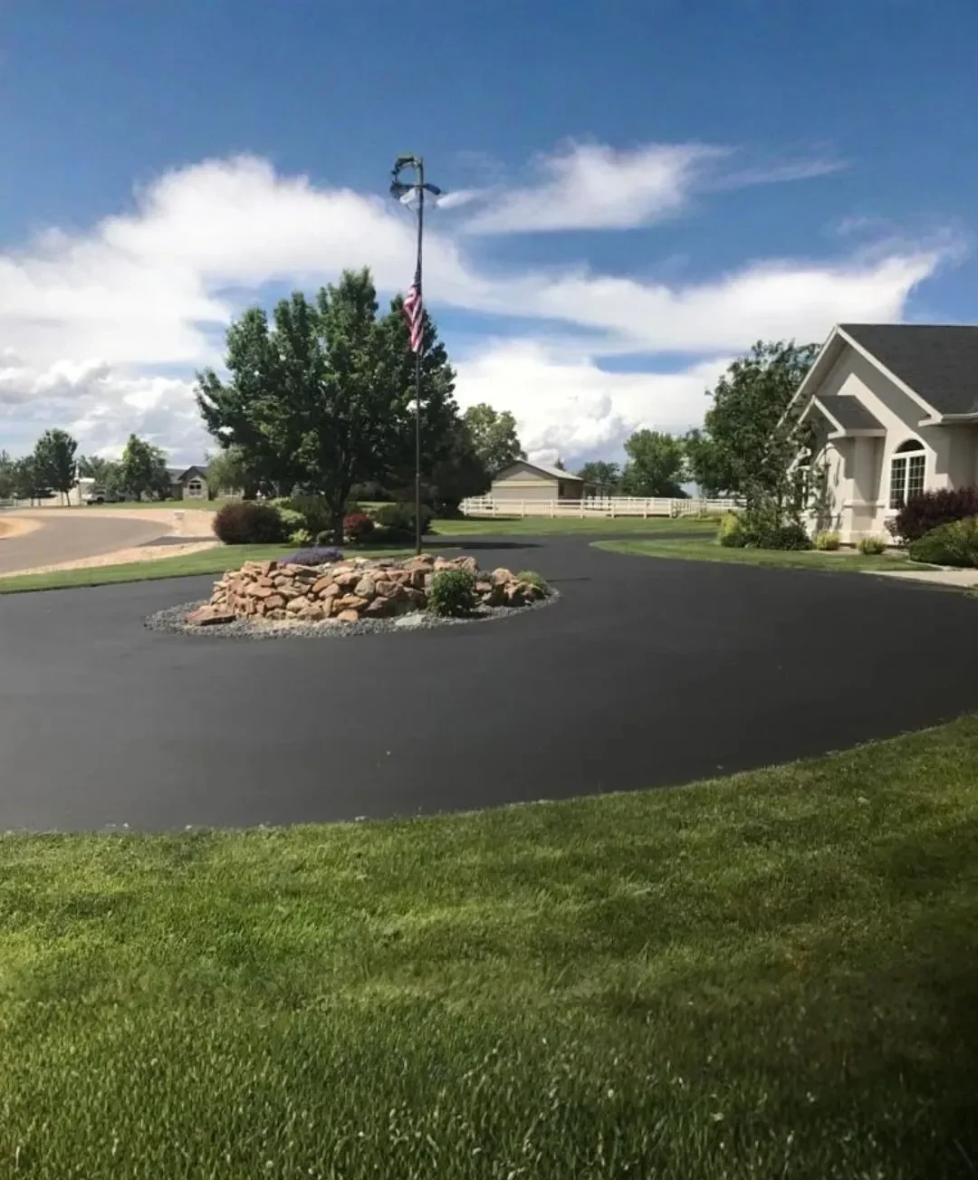 Sealcoating on a smooth residential driveway in Idaho