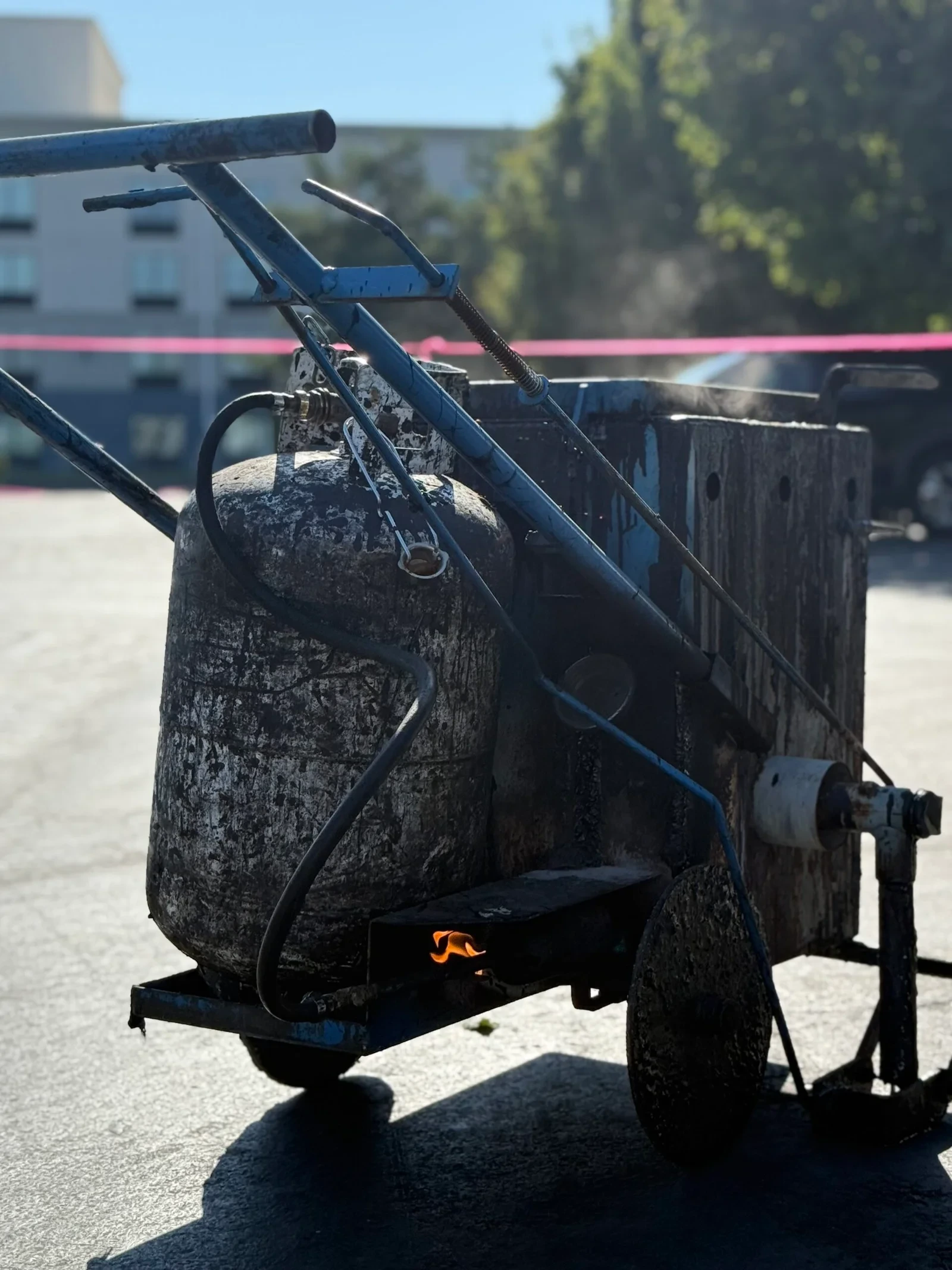 Crack filling equipment heating material for asphalt repair