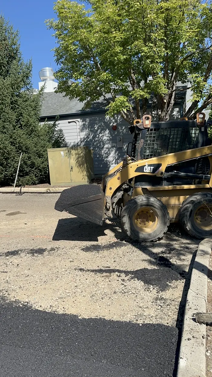 Asphalt Paving Installation CAT Skid Steer Idaho