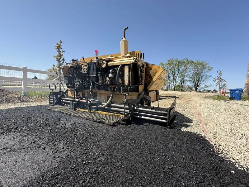 Paving Crew Operating Gehl Paver and CAT Loader