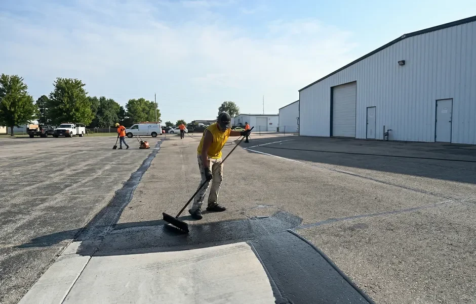 Full Superior Striping Crew Sealcoating Large Asphalt Lot in Nampa, Idaho
