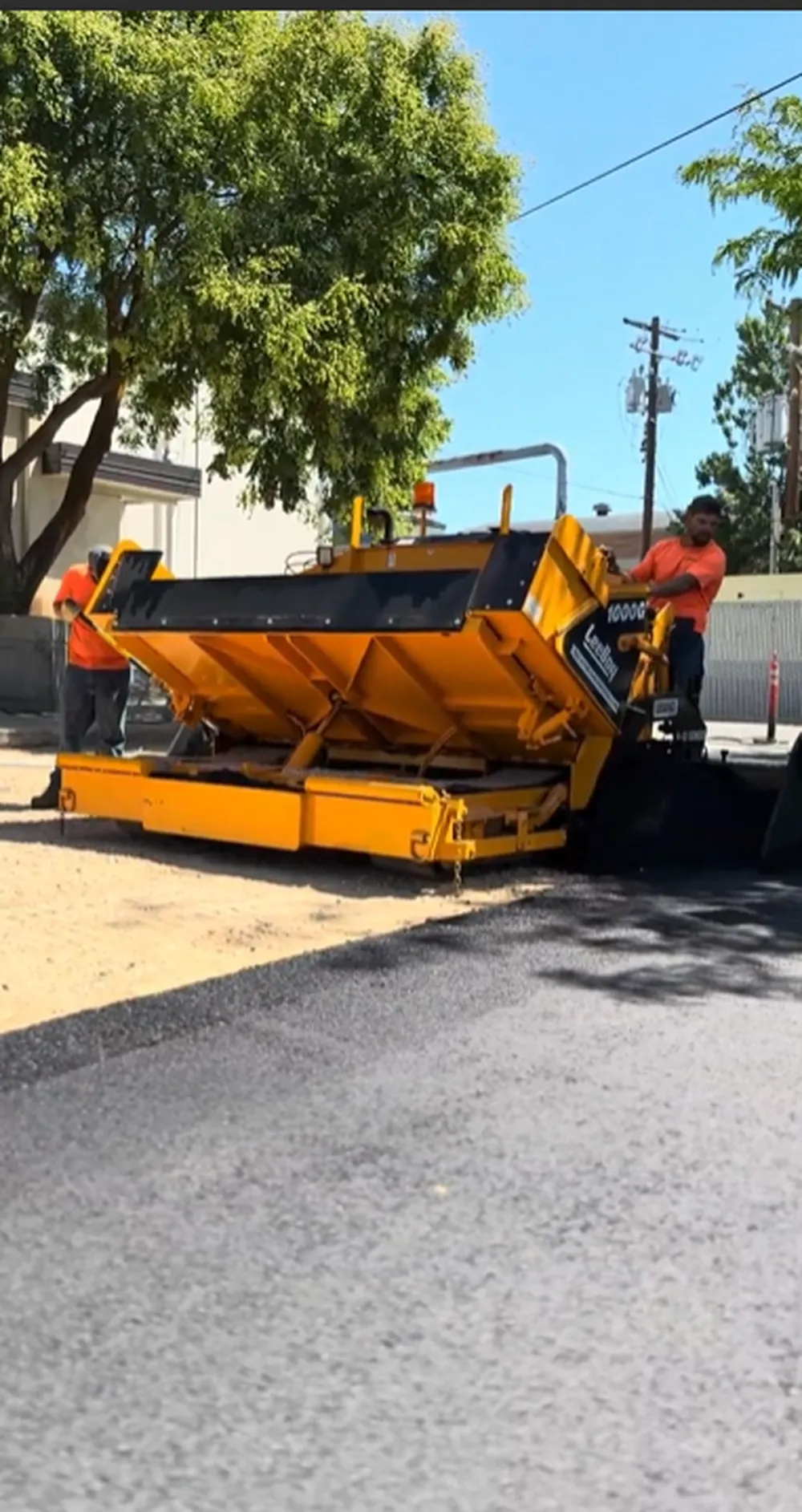 Leeboy 1000G Asphalt Paver With Open Hopper Being Operated by Superior Striping Crew in Boise, Idaho