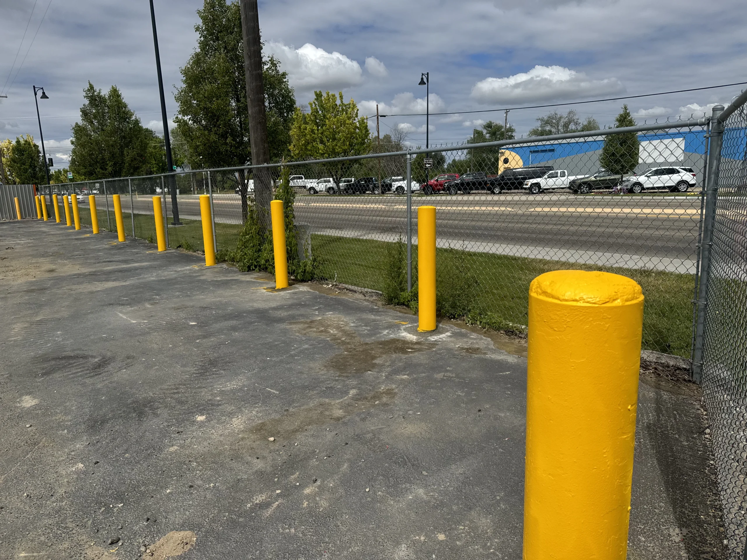 Yellow Safety Bollard Installation for Perimeter Protection in Treasure Valley