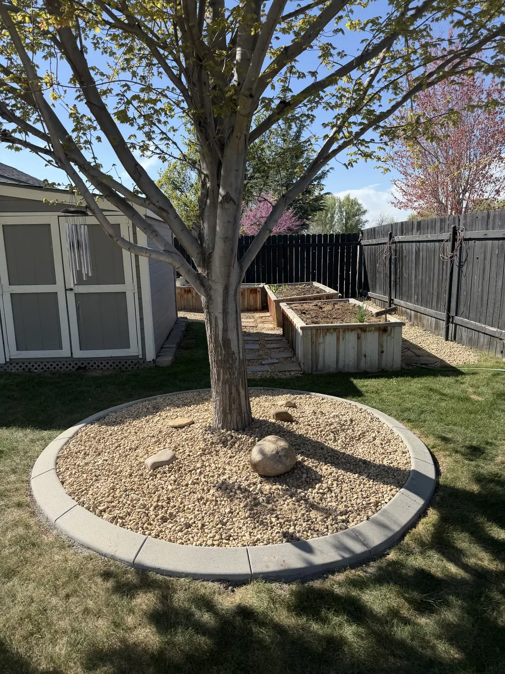 Superior Striping Decorative Rock Tree Ring and Garden Bed Installation