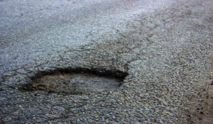 How to Repair Cracks in Your Asphalt Driveway