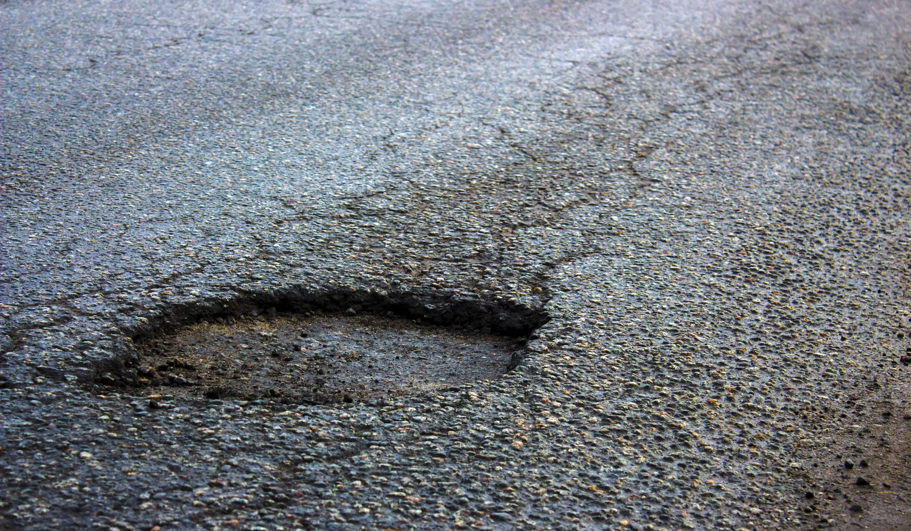 How to Repair Cracks in Your Asphalt Driveway
